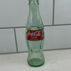 Vintage 1997 Christmas Coca-Cola Classic Bottle with Red Label